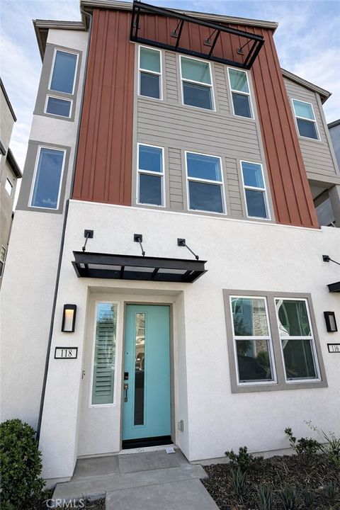 Photo of 118 Tenor, Irvine, CA 92618 (MLS # OC26045696)