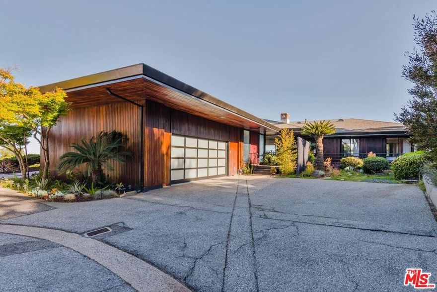 One of a kind private and gated estate perched above the hills of Palos Verdes with breath taking unobstructed views of Pacific Ocean, Catalina Island, San Pedro harbor, city lights and mountains. This extraordinary single level home sitting on more than an acre of land offers open floor plan with 3 bedrooms, a bonus room and 3 bathrooms. Kitchen opens to dining area, large family room, with a cozy fireplace adjacent to the living room and a large wet bar making it a spacious great room, all looking out to the incredible views through large full height glass doors and windows. Remodeled kitchen and baths showcase top of the line appliances, designer tiles and fixtures. Large decks and turf backyard compliment the space for large gatherings. Oversized two car garage and circular driveway offer plenty of parking. This sophisticated and inviting compound is the ideal place to call home close enough to everything, but far enough to relax in absolute privacy and serenity. Must see!