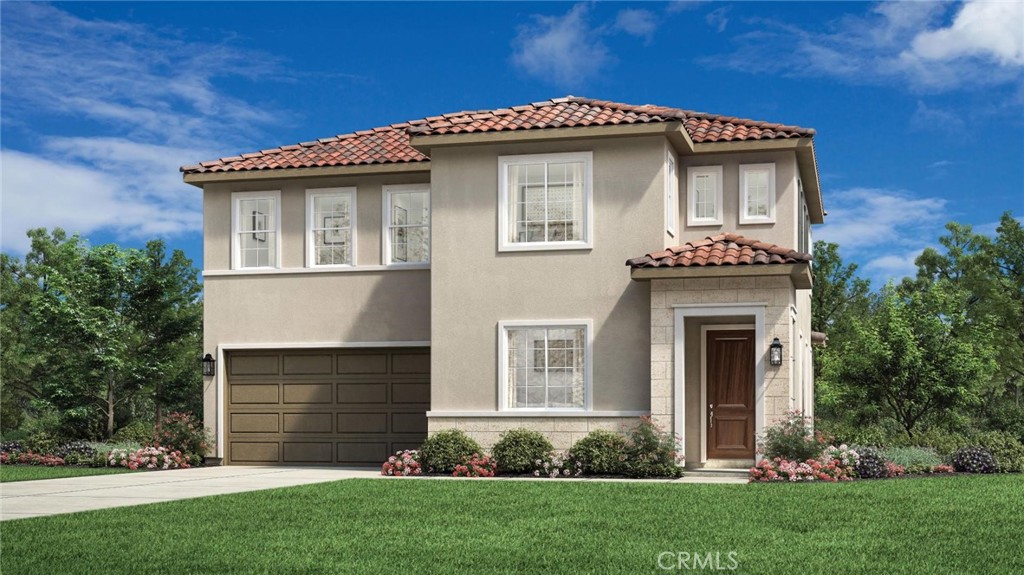 Welcome to Vista Rose, a new community located in Placentia which is close to Brea, Yorba Linda and the Anaheim Hills. Homesite 51 is a new construction home that is situated on a low maintenance homesite with easy access to the front gate. The Prairie floorplan features 4 bedrooms, with 3 full bathrooms, and is 2,255 sq. ft, with a 2 car garage. Upon entering the home you'll be greeted by an alluring great room that overlooks a welcoming foyer with a bright casual dining area, the kitchen features an oversized Peninsula with breakfast bar, wrap around counter and ample cabinet space. The primary bedroom suite is secluded on the second floor, complete with a stunning walk-in closet and a serene primary bath with a dual sink vanity, large soaking tub, a lux shower and a private water closet. The secondary bedrooms offer sizable closets and share a full hall bath with a separate dual sink vanity area, also included is a desirable first floor bedroom and shared hall bath with a walk in shower. Highlights of the home include 9 foot high ceilings, a glass handrail on the staircase, and many thoughtfully curated designer appointed features selected by our design team. The community amenities include private park for homeowners, HOA maintained front yards, as well as a gated entry to the community. Homesite 51, has an estimated closing date in early 2026. Photos provided are renderings, actual home is under construction.