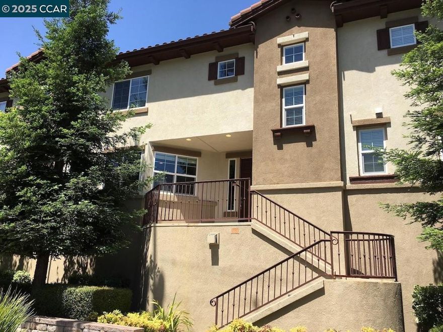 You'll love this immaculate, tri-level executive townhome located among a mixture of Victorian restored homes & historical architecture - just blocks from Downtown Martinez. Boasting 1,370 sq ft, 3 bedrooms, 2 full bathrooms & one-half bathroom, high ceilings, beautiful hardwood flooring & freshly painted interior, this is the perfect place to call home.  As you walk up the steps to the front door, you will be delighted by the spacious front patio, the perfect place to BBQ & entertain family & friends all year round. Entering the home, you are welcomed by an open floor plan & an inviting living room w/ beautiful hardwood flooring & flanked w/ a wall of windows making the room feel airy & bright. The living room also includes a gas fireplace w/ stone mantle & built in entertainment center and pre-wired for home theater. The lovely eat-in kitchen is equipped w/ stainless steel appliances, including gas range, microwave, dishwasher, refrigerator & boasts plenty of countertop & cupboard space, 2 additional generous pantries for even more storage & sleek stone countertops making cooking & entertaining a delight! A charming powder room rounds off the functional & open layout of the first floor. 2nd floor-primary retreat & en-suite, 2 bedrooms, a full bathroom & Laundry.