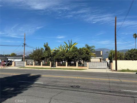 Photo of 14053 Olive St, Baldwin Park, CA 91706 (MLS # AR26033338)