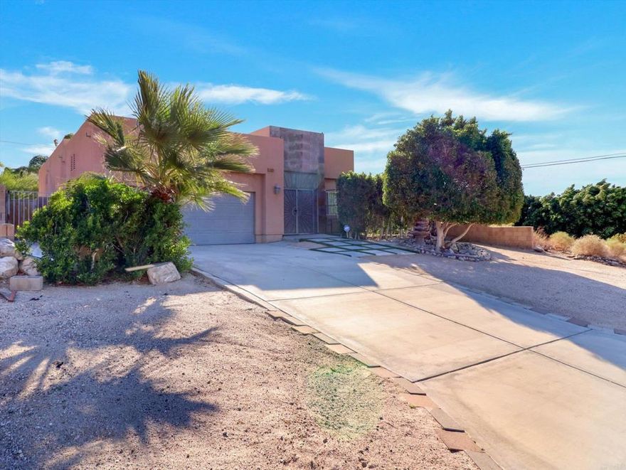 Spectacular Quiet Desert Living  Modern 3 Bedroom home with office that could be the 4th bedroom or den. Property is located up on the Eastside of town looking down on sweeping  views of Palm Springs and the surrounding mountains. Duel indoor/outdoor entries. Tile flooring in the entry, kitchen and baths. ceiling fans and upgraded lighting. beautiful darker stained kitchen cabinets with granite tile counter tops. Master bath includes luxury tile flooring as well as in the oversized shower. Primary bedroom has a walk-in closet and also features a sliding glass door that leads to the enclosed low maintenance landscaped backyard. Livingroom also has a gas fireplace as well as another sliding glass door to the backyard. Sperate indoor laundry room with direct access to the double car garage. Easy commute with convenient access to the freeway