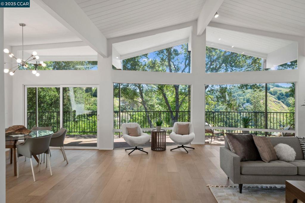 Welcome to this fully remodeled single-level mid-century modern masterpiece nestled in the serene foothills of Sleepy Hollow's highly coveted, private, Sandhill neighborhood. Enjoy the elite k-12 public school system that Orinda offers. Sweeping views of the hills and valleys, the sounds of nature, and the beauty of the local flora and fauna allow for an easy path to peace in this unique slice of paradise. Indoor/outdoor mid-century living and entertaining at its best! Floor to ceiling windows and 9 skylights fill the living space with warm natural light. The nearly 4 acre lot offers the owner unparalleled privacy and the opportunity for expansion; plant an orchard or vineyard, or extend the deck and add a pool. (ADU plans provided!) The chef's kitchen is fully equipped with stainless high end appliances including a 48" Sub Zero refrigerator/freezer, a 6-burner professional Wolf range, and quartz countertops. Just 15 feet from the attached garage to the kitchen counter. The remodel left nothing in question; low maintenance hardscaping, new roof and gutters, walls, windows and sliding doors, appliances, Phylrich and Gröhe fixtures, decking, siding, kitchen, bathrooms with programmable radiant heated floors, flooring, gas lines, water lines, and a 7-zone HVAC mini-split system.