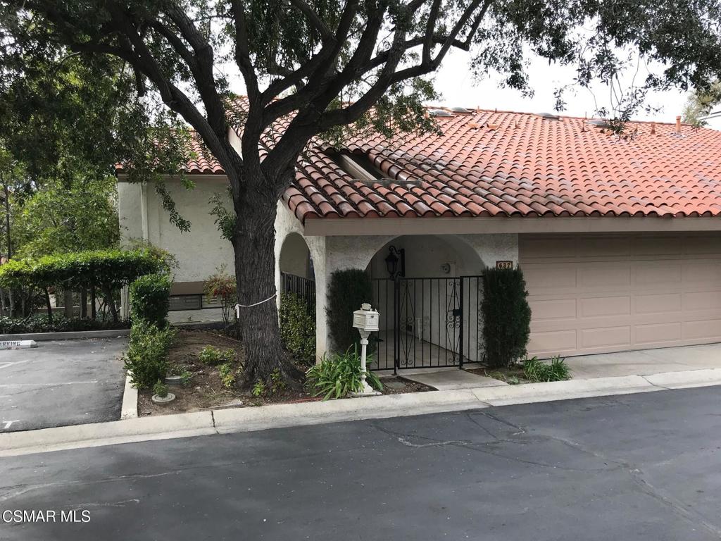 In the desirable gated community of North Gate is this delightful two-level home (half flight down to living, half flight up to bedrooms. Freshly cleaned and appointed with refrigerator, granite countertops, gas range, microwave, dishwasher, remodeled bathrooms, upgraded double entry doors and smooth vaulted ceilings. There are plantation shutters, wooden flooring throughout, closet built-ins and laundry in the home (washer and dryer included without warranty). There is a two-car garage with epoxy floor and exceptional storage cabinets, one balcony and a relaxing private patio. This home does not back to any roads and is elevated with a view of the tree tops. North Gate has a peaceful pool & spa and is convenient to shopping, restaurants and markets.