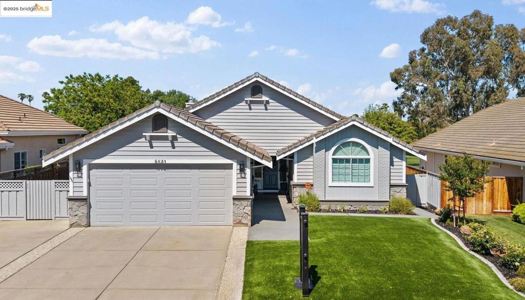 This luxurious Discovery Bay home provides the best of golf course living! Stunning views of lagoon & the 1st green, + the joy of a freshly remodeled single story, turn-key ready for the meticulous home buyer! This home is beautiful from the curb, w/ low maintenance artificial turf, & just keeps getting better! New up-to-date flooring, completely new kitchen, new carpet, paint inside and out, new HVAC- so much thought was put into making a beautiful yet functional space for everyday living or special moments! Chef's kitchen is gorgeous, w/ eat-up island, current fixtures, deep sink & wine fridge. Unique under cabinet windows enhance lighting, stunning backsplash + leathered granite counters that work seamlessly for a warm aesthetic and practical use. Great room has a fireplace for chillier nights & wide sliders for views of the backyard spaces and the lagoon/golf course. Three private bedrooms, two en-suite, including the captivating primary suite with its own sliders to back porch! Huge walk-in closets & pristine bathroom space make this room a peaceful hideaway. Fully fenced backyard & completely covered deck extend your living space for all seasons. Side yard access provides storage or dog run. Two and a half car garage for cars and a golf cart + extra storage. See it soon!