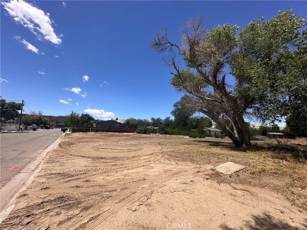Attention investors and builders! Don’t miss this exceptional opportunity to acquire flat, buildable land in a prime Victorville location. With water, power, and sewer connections readily available at the street, this property is development-ready. Conveniently located near Eva Dell Park, Historic Old Town Victorville, and the California Route 66 Museum, it offers easy access to local amenities and public transportation. A rare chance to invest in a growing area—act now!