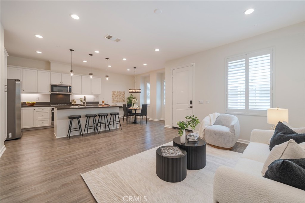 Seller may offer a concession toward a 2/1 interest rate buydown, subject to lender approval.
Welcome to your dream retreat! This stylish 1-bedroom, 1.5-bath home features an open-concept layout with high ceilings, natural light, and a modern kitchen with quartz countertops and stainless steel appliances. The upstairs primary suite includes a walk-in closet and spa-like bathroom. Enjoy the convenience of an attached garage with EV charger, in-unit laundry, Ring security system, and access to Esencia and Ranch Camp amenities—pools, parks, gym, arcade, dog park, and more. Located near the toll road and top-rated schools, this home blends luxury, comfort, and community living. Don’t miss out!