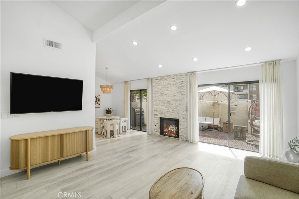 Rare Updated End-Unit Townhouse in Woodland Hills with Vaulted Ceilings and direct Garage access.
This charming 2-bedroom, 2 Full bathroom townhouse offers 1,054 sq ft of living space with vaulted ceilings and recent upgrades. Features include a remodeled master bathroom, remodeled kitchen and guest bathroom. There is a fireplace in the living room, walk-in closet in the primary bedroom, and an extended large private patio. Attached 2-car garage with Direct Access to the unit with washer and dryer, plus community amenities like a pool, spa, and tennis courts. Conveniently located near Topanga Mall, The Village, and the 101 Freeway.