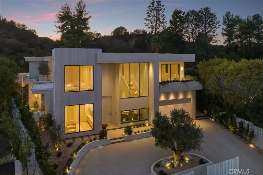 Stunning Modern Tulum-Style Masterpiece in Prime Encino Hills with EASY WESTSIDE ACCESS and VIEWS!! VERY PRIVATE!
Introducing a breathtaking new construction that embodies the essence of luxury living—a modern Tulum-style masterpiece crafted by one of Los Angeles' most sought-after builders and designed by Yeara Design Studio. This exquisite residence offers an unparalleled blend of sophistication, comfort, and style, perfect for those who seek the finest in contemporary living.
Upon entering, you are greeted by an expansive open floor plan, seamlessly integrating indoor and outdoor spaces with elegant pocket doors that invite the beauty of nature inside. The state-of-the-art media room promises cinematic experiences at home, while the sun-drenched living areas are adorned with high-end finishes and abundant natural light and stunning VIEWS!
Step outside to discover a resort-style backyard that is nothing short of a personal oasis. Dive into the sparkling outdoor pool, unwind in the soothing spa, or entertain guests under the stylish cabana complete with a full bathroom. As the sun sets, gather around the sunken fire pit, perfect for cozy evenings.
The gourmet kitchen is a culinary enthusiast's dream, featuring top-of-the-line Miele appliances, custom cabinetry, and exquisite stone finishes that exude luxury. The home offers a spacious layout with a relaxing loft on the second floor, ideal for casual gatherings or peaceful retreats.
Retreat to the master suite, where a Tulum-style spa bathroom awaits, reminiscent of a five-star hotel. With the highest grade finishes throughout, every detail has been meticulously considered, ensuring an atmosphere of tranquility and elegance.
Completing this remarkable property is a generous four-car garage, providing ample space for vehicles and storage.
Located in the prestigious Encino Hills, this home offers easy access to the vibrant Westside and is close to upscale dining, shopping, and top-rated schools. Experience the perfect blend of luxury and lifestyle in this extraordinary Tulum-style residence—where every moment feels like a getaway. Welcome home.