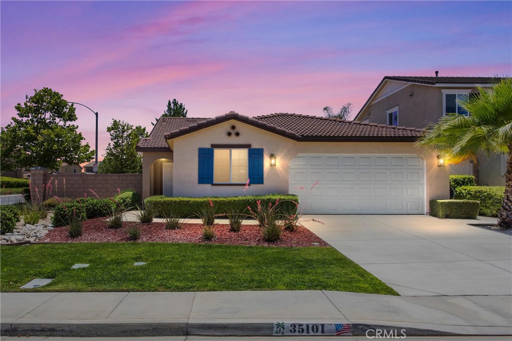 Welcome home to 35101 Caraway Court, nestled in the highly sought-after Canyon Hills community of Lake Elsinore. This beautifully maintained single-story home sits on a corner view lot in a quiet cul-de-sac and truly shows like a model. Featuring 4 bedrooms and 2 bathrooms, the home boasts an open floor plan with high ceilings, abundant natural light, and upgraded luxury vinyl flooring throughout. Enjoy indoor-outdoor living with two sliding doors that open to a spacious, manicured backyard complete with a covered patio—perfect for entertaining. Located within walking distance to elementary and middle schools, community parks, pools, sports fields, dog parks, and scenic open spaces.