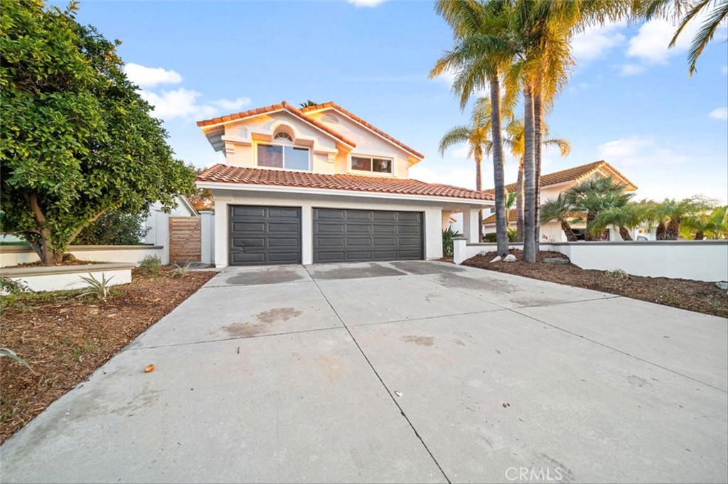 **STUNNING POOL HOME** Welcome to 30901 Wellington Circle, where luxury and modern comfort meet in a prime location! Newly REMODELED, this home envelopes you with warmth and light from your first step inside the spacious living area with NEW laminate flooring and vaulted ceilings. Host elegant dinners in your adjoining dining space with oversized windows framing a perfect view to your picturesque backyard. Gourmet kitchen is a chef and entertainers delight with NEW countertops, NEW cabinetry, NEW appliances, custom tile backsplash, breakfast bar and large center island. Kitchen opens to cozy family room with stone fireplace and custom mantle. Home features a total of 5 bedrooms including one downstairs adjoining a full bathroom with walk in tile shower. You will also find a large laundry room downstairs highlighted with designer touches. Make your way upstairs to find 4 more bedrooms along with an additional two bathrooms including upgraded guest bathroom with double sinks and sleek custom tile flooring. Primary bedroom has attached en-suite bathroom remodeled with NEW cabinets, countertops, fixtures, freestanding bath and more! Additional upgrades to the home include NEW paint inside and out and NEW modern lighting fixtures. Now for the best part…your OVERSIZED 9,148 sq ft LOT is truly a private oasis with large patio area, refreshed in-ground POOL and SPA with NEW tile accents, and surrounded by palm trees creating the perfect ambiance for relaxing or entertaining. All this and ideally located just minutes from Temecula’s famous wineries, top rated schools, and an abundance of shopping and dining options! Start enjoying the Temecula lifestyle today!