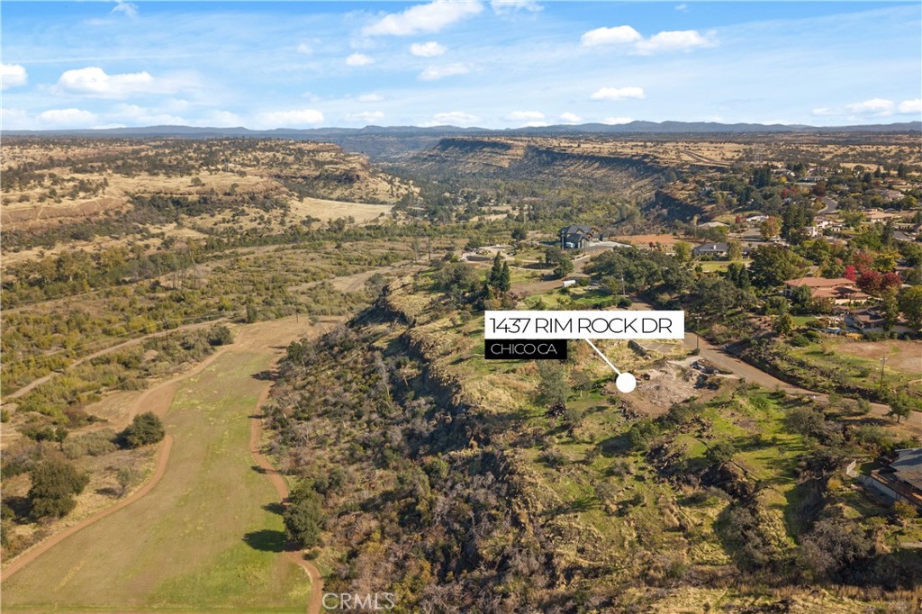 Discover this awe-inspiring 0.66-acre parcel of land, offering breathtaking panoramic views high above Butte Creek Canyon. This prime location, just 3.8 miles up the Skyway from the Bruce Rd intersection, is situated within the prestigious Skansen development. Enjoy the serenity of unobstructed open spaces while being only minutes away from shopping, dining, and convenient freeway access. Formerly the site of a custom-built 4-bedroom, 3-bath residence spanning 3,608 square feet, complete with a spacious 3-car garage, an inviting in-ground pool, and a rejuvenating hot tub. The property still boasts its driveway and various hardscape features, including retaining walls. All tree stumps have been removed, the topography is fully prepared, and property boundaries have been clearly marked. For those considering new construction, impact fees will only be assessed beyond the original footprint of the pre-existing home, which was 3,608 square feet. Acquiring this lot comes with the added benefit of receiving substantial credits for impact fees, potentially saving you thousands of dollars!