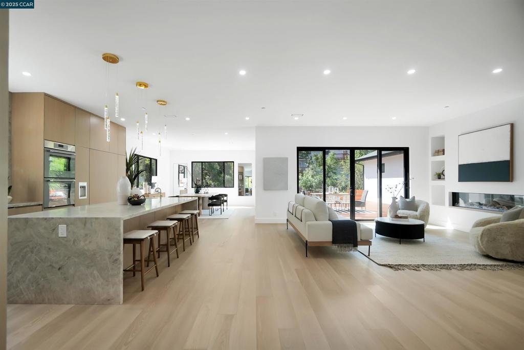 Step into standout modern living at 1080 Scots Ln-where sleek design meets East Bay comfort in the heart of Walnut Creek. This new construction stunner features a sun-drenched open floor plan with 4 bedrooms, 3.5 baths, over 4,100sq ft and head-turning finishes like Brazilian white oak floors and custom cabinetry. The gourmet kitchen is ready for entertaining with pro-grade appliances, statement island, and seamless indoor-outdoor flow. Escape to your own sanctuary in the spa-inspired primary suite, complete with a marble wet room, soaking tub, and rainfall shower. Massive Andersen sliders open to a backyard made for California living-IPE hardwood deck, low-maintenance turf, and room to kick back or host a crowd. Further enhancing this exceptional property is a versatile, detached 2bd/1bath ADU complete with its own full kitchen and private entrance-perfect for guest accommodations, extended family, or a stylish home office. Energy-efficient design, owned solar, and upgraded insulation mean long-term comfort and lower bills. All this just steps to Shell Ridge trails, top-rated schools, great dining, and the best of downtown Walnut Creek. If you’re looking for turnkey luxury with true personality-don’t wait. Experience 1080 Scots Ln in person - schedule your private tour today!