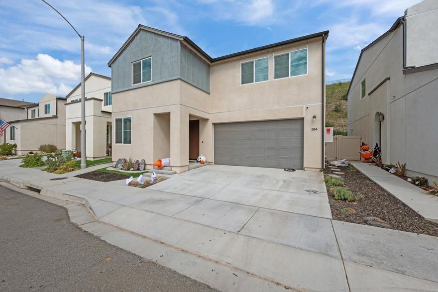 Welcome to 264 Hass Lane — a beautifully maintained three year old home with 5-bedrooms, 3-bathrooms offering over 2,200 sq ft of flexible living space in the heart of scenic Fallbrook. Tucked away on a peaceful street, this spacious residence features an open-concept layout, abundant natural light, and solar power for energy efficiency.  Step inside to find a thoughtfully designed floor plan with a large living area, a modern kitchen with ample cabinetry, and room for both casual and formal dining. The main level includes a full bedroom and bathroom—perfect for guests, multigenerational living, or a home office. Upstairs, the generous primary suite boasts a walk-in closet and ensuite bath, complemented by three additional bedrooms and another full bathroom. Outdoors, the expansive lot offers endless possibilities—garden, entertain, or simply enjoy the quiet privacy of this charming neighborhood. With central heating and air, a 2-car garage, water filatration system, and newer upgrades throughout, this home is move-in ready and built for comfort.  Enjoy the rural charm of Fallbrook while still being just minutes from shops, dining, top-rated schools, and easy freeway access. Whether you're looking for space to grow or a peaceful place to call home, this one checks every box!