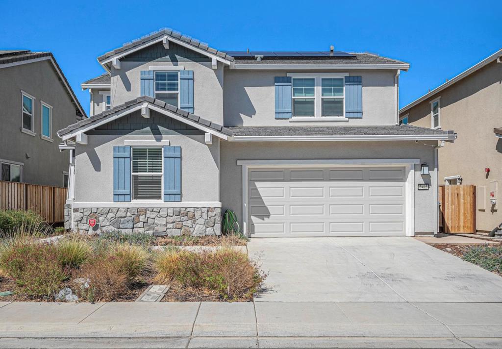 Welcome to your dream home in the desirable gated Cielo at Sand Creek community, zoned forTop Rated Brentwood School District! This stunning, nearly new construction home offers over $50,000 in upgrades, providing an exceptional living experience with modern design and thoughtful details throughout. Built in 2023, this spacious two-story residence features 4 bedrooms and 3 full baths, including a convenient ground floor bedroom and full bath, ideal for a growing family or guests. The heart of the home features a gourmet kitchen with a stunning barn-style sink, elegant quartz countertops, and an oversized island with a sink, ideal for entertaining and building lasting memories. Upstairs, the luxurious master suite offers a spa-like retreat with a his-and-hers closet and a sunk-in tub. But the upgrades don't stop there. The backyard is an entertainer's dream professionally landscaped with stamped concrete and lush turf. A beautiful pergola provides the perfect shaded spot for outdoor dining, relaxing, or hosting friends & family. Residents can enjoy fantastic community amenities, including a pool, park, basketball and tennis courts, and a BBQ area. The location is unparalleled, just minutes away from shopping, restaurants, and the newest and largest Costco in California!