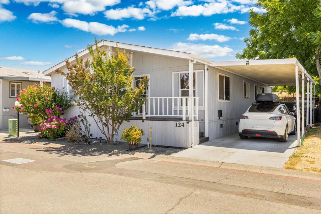 Welcome to 1220 Tasman Dr #124, a beautifully updated 3-bedroom, 2-bathroom home offering 1,336 sq ft of functional living space in the desirable Adobe Wells community. This move-in ready home features a spacious layout, new flooring, a remodeled kitchen with granite countertops, stainless steel appliances, walk-in pantry, and skylight. Enjoy two living areas, a private primary suite with backyard access, and a large yard with mature fruit trees and patio. Recent upgrades include newer roof, water heater, indoor laundry, and composite decking. Adobe Wells offers resort-style amenities including a pool, spas, gym, tennis court, playground, and RV parking. Rentals allowed great for investors with Levis Stadium minutes away. Located in Santa Clara Unified, near top-rated Mission Early College High (10/10 GreatSchools). Easy access to 101, 237 & 85.