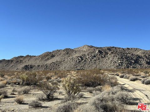 Photo of 4 Wolfe Road, Twentynine Palms, CA 92277 (MLS # 25569537) Photo of 4 Wolfe Road, Twentynine Palms, CA 92277 (MLS # 25569537)