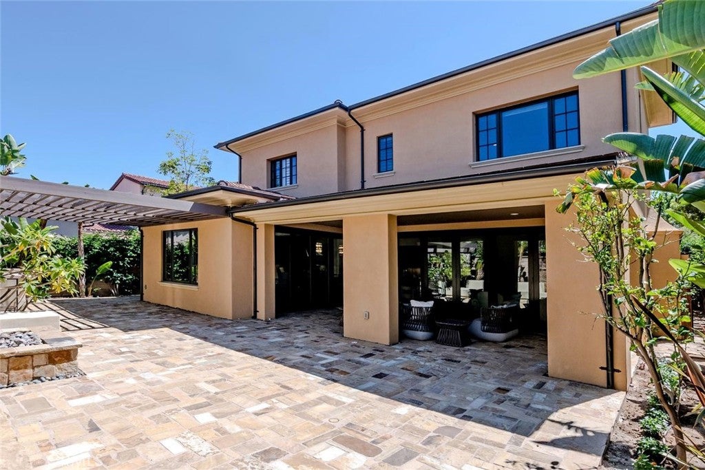 Photo of 115 Candleglow, Irvine, CA 92602 (MLS # SR26200047)