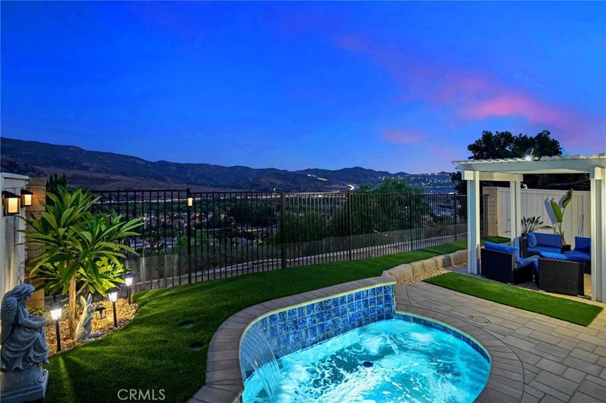 Views! Views! Views! Stunning Panoramic Views from Highly Upgraded 4-Bedroom, 3-Bathroom Home in La Terraza! Spacious 2,621-SqFt Townhome (largest floorplan in the tract) has High Ceilings and a Very Desirable Main Floor Bedroom & Bathroom with Shower - Super Private & Low-Maintenance Backyard Boasts Artificial Turf, Pavers with River Rock Accents, Alumawood Pergola Patio Cover, and In-Ground Pebbletec Spa with Waterfall ... All Surrounded by Breathtaking Views of Rolling Hills, Trees & City Lights - Gorgeous Fully Remodeled Kitchen Features Custom Soft-Close Cabinetry, Quartz Countertops with Subway Tile Backsplash, Elkay Sink, Walk-In Pantry, Bar Top Seating, and Black Stainless-Steel Appliances, Including Dishwasher, Gas Cooktop/Oven with Hood, and Refrigerator - Kitchen Opens to Re-Designed Family Great Room with Dual-Sided Gas Fireplace - Formal Living & Dining Rooms - Quality Upgrades Throughout this Property, Including Plantation Shutters, Silhouette Blinds, Luxury Vinyl Plank & Engineered Wood Flooring, Custom Light Fixtures, Ceiling Fans, Floating Shelves, and More! Double Door Entry to Oversized Primary Suite with Walk-In Closet & Romantic Gas Fireplace - Completely Remodeled Primary Bathroom Offers Dual Quartz Vanities, Tile Flooring, Soaking Tub & Separate Seamless Glass Shower - Also Upstairs are 2 More Good-Sized Bedrooms, a Jack-and-Jill Full Bathroom, and Convenient Laundry Room - Newer HVAC System with Nest Learning Thermostat - Complete Plumbing Re-Pipe with Added NuvoH20 Water Softener System & Newer Hot Water Heater - Newer Dual-Pane Windows & Sliders with UV & Sound Control in Family Room & Living Room - Attached 2-Car Garage has Newer Garage Door & Direct Access Into the Home - The La Terraza Community has 2 Assoc Pools, 2 Spas & Tennis/Pickleball Court ... HOA Covers Exterior Maintenance of the Home (roof, stucco, termite, paint, etc) and Front Yard Landscape Maintenance - Award-Winning Placentia-Yorba Linda School District, Home is Zoned for Bryant Ranch Elementary, Travis Ranch Middle & Yorba Linda High Schools - Easy Access to the 91 Freeway & 241 Toll Road - Move In, Spread Out & Enjoy the View!