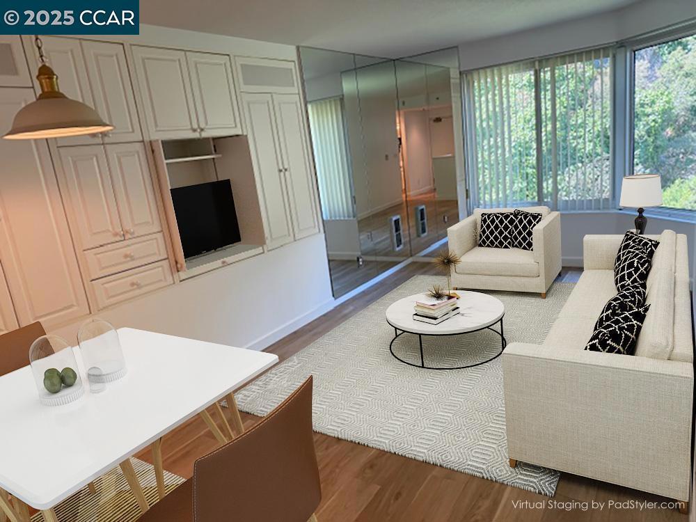 Located in the heart of iconic Telegraph Hill, this updated 1-bedroom, 1-bath condo offers the perfect blend of comfort, convenience, and city living. Set within a luxury building, this nearly 600 sq ft home features brand-new pre-engineered hardwood flooring, plush new carpet in the bedroom, fresh paint throughout, and elegant new baseboards — making it truly move-in ready. Enjoy a peek of the Bay from your window, and take advantage of premium amenities including 24-hour security and doorman service, a modern fitness center, club room with full kitchen, guest suite, and free laundry facilities on every floor. Secure underground parking adds extra peace of mind. With a Walk Score of 87, you're just steps from vibrant North Beach restaurants, shops, public transportation, and the waterfront excitement of Pier 39. Whether you're a first-time buyer, or seeking the ideal city pied-à-terre, this is a must-see opportunity in one of San Francisco’s most desirable neighborhoods.