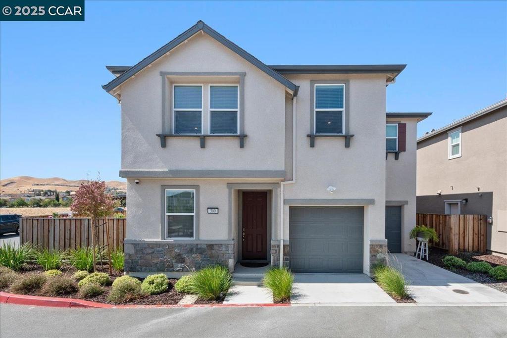 Welcome to 300 Hideaway Lane, a beautifully maintained 4BD/3BA home in a quiet Pittsburg neighborhood with an open, light-filled floor plan and a gourmet kitchen featuring granite counters and a large island. The spacious primary suite offers a walk-in closet and spa-like bath. Enjoy a fully cemented, upgraded backyard on a premium corner lot, providing privacy and low maintenance, perfect for gatherings or quiet evenings. Home includes leased solar, central HVAC, and a two-car garage. Conveniently located within walking distance to the Shops at San Marcos plaza, Sprouts, Safeway, coffee shops, dining, and parks, with easy BART and freeway access. A must-see!