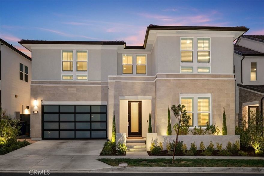 NO MELLO ROOS TAX! OVER $500K IN UPGRADES! Welcome to 160 Royal, a stunning Rosewood Plan New-Build home by the Award-Winning Toll Brothers just steps away from the clubhouse. Enjoy numerous luxurious upgrades; glass handrails that line the grand wood staircase and extends past to the loft, $25K in hard flooring, custom in-floor spa, and sleek glass garage door. Located in a premium location next to the park and Clubhouse, this 5-Bedroom, 5.5-Bathroom home is part of the Evergreens Neighborhood in the Meadows, featuring the biggest floor plan in the track.

Built for natural light, grand ceilings and abundant windows gives the living areas a bright, inviting feel that flows throughout the open-concept home. Panoramic multi-slide glass doors line the Great Room wall, inviting abundant sunlight and seamless views of the backyard. A ground-floor guest suite near the entrance offers comfort and privacy. The Great Room opens up to the kitchen, showcasing stainless-steel built-in Jenn-Air appliances, and an oversized central island. Dark blue shaker-style cabinets extends to the ceiling, and Granite countertops complete the space.

The primary suite features a luxurious bath equipped with a soaking tub, dual vanities, and sleek frameless-glass walk in shower. Past the bathroom is a light-filled, spacious walk-in closet. The upstairs loft and additional ground floor flex space offers endless possibilities for a home office, gym, or creative studio. 

Enjoy a brand-new community with 7 nearby parks, 10 acres of dedicated open spaces and trails system, and resort-style amenities featuring a recreation center, two pools, spas, covered cabanas, and numerous sport courts. Located less than a mile from major retailers, such as Home Depot, Target, Michaels & more, multiple dining options, and just minutes from the Irvine Spectrum Center.