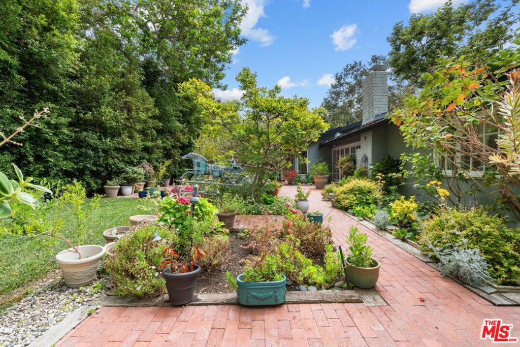 This immaculate one-story home is located on a beautiful private cul-de-sac in the highly desirable Malibu West community, which includes access to the Malibu West Beach Club, tennis and pickle-ball courts. One of the largest one-story homes in Malibu West, this beautifully remodeled ranch style home is in immaculate condition, featuring spacious living areas and an abundance of natural light. Enter through the formal entry into the living room w/vaulted wood ceilings, fireplace & French doors leading out to the back garden patio. Formal dining room has hardwood floors, wet bar and an abundance of natural light. Cozy family room with with fireplace opens to a large updated cook's kitchen w/granite counters, spacious island w/cooktop, and all brand new high-end appliances, including LG refrigerator/freezer, KitchenAid double ovens & Miele Dishwasher. The Primary bedroom suite has vaulted ceilings, a fireplace, french doors, walk-in closet & beautifully appointed bathroom with tub and double shower. There are three additional bedrooms - including a spacious ensuite bedroom w/windows to the garden, and a bathroom with stone floors & marble vanity. The sunny back yard patio is fully fenced, with brick pathways & lovely flower-filled gardens. Enjoy the extra amenities of the private beach club adjacent to Broad Beach, with clubhouse, showers, and direct access to the beautiful sandy beach. Also included is access to the tennis and pickle ball courts, nestled in the trees at the far end of the community. This lease is available now, and will provide a wonderful home, with an inviting sense of community & privacy.