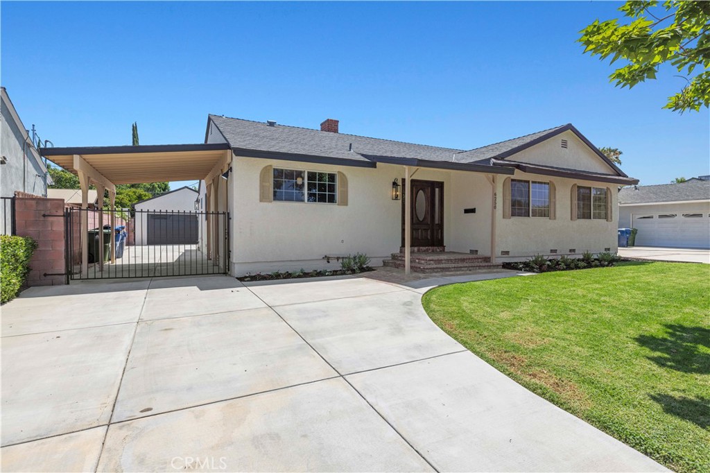 This beautifully remodeled residence is nestled on a tranquil, tree-lined street within the highly sought-after Tarzana neighborhood. It features a spacious open floor plan, comprising three bedrooms, a generously sized bonus room, and two and a half bathrooms. The property boasts a gated, extended concrete driveway that leads to a detached, oversized two-car garage and additional carport parking.
The kitchen has been tastefully updated with refinished cabinetry, new countertops, a stylish backsplash, and modern appliances. Throughout the home, you will find new laminate plank flooring, updated baseboards, new doors, fresh interior and exterior paint, and designer light fixtures. All three bathrooms have been meticulously remodeled with custom tile work, new vanities, countertops, and fixtures. This home offers an ideal layout for entertaining, including a large primary suite with a walk-in closet and a spacious bathroom. Priced to sell fast.