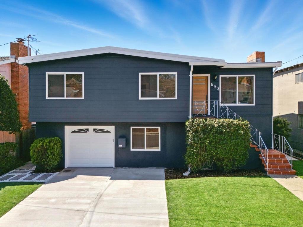 Refined modern living on a quiet Sign Hill cul-de-sac with sweeping South City views. This extensively renovated two-level home offers 4 bedrooms, 3 full bathrooms, and a reconfigured layout designed for comfort and function. A newly added family room on the lower level opens directly to the backyard, ideal for recreation or guest use. The main floor separates the bedrooms from the living and kitchen areas, enhancing privacy. Interior updates include engineered wood flooring, a brand-new kitchen with quartz countertops, LED under-cabinet lighting, and stainless-steel appliances. All bathrooms have new tile, vanities, and fixtures. Electrical and mechanical systems include a 200 AMP panel, recessed LED lighting, updated HVAC ducting, and battery-powered smoke/CO alarms. Garage features epoxy flooring, fire-rated wall and ceiling, and structurally reinforced. Additional highlights include a new Class A roof with waterproofing, Milgard double-pane windows with bug screens, fresh exterior paint, a Caldwell walnut-finish entry door, and a steel-railed deck overlooking the city. Located minutes from Sign Hill Park, Oyster Point, and downtown SSF, with easy access to BART, Caltrain, this house combines thoughtful updates, indoor-outdoor functionality, and a peaceful, elevated setting.