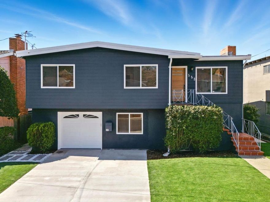 Refined modern living on a quiet Sign Hill cul-de-sac with sweeping South City views. This extensively renovated two-level home offers 4 bedrooms, 3 full bathrooms, and a reconfigured layout designed for comfort and function. A newly added family room on the lower level opens directly to the backyard, ideal for recreation or guest use. The main floor separates the bedrooms from the living and kitchen areas, enhancing privacy. Interior updates include engineered wood flooring, a brand-new kitchen with quartz countertops, LED under-cabinet lighting, and stainless-steel appliances. All bathrooms have new tile, vanities, and fixtures. Electrical and mechanical systems include a 200 AMP panel, recessed LED lighting, updated HVAC ducting, and battery-powered smoke/CO alarms. Garage features epoxy flooring, fire-rated wall and ceiling, and structurally reinforced. Additional highlights include a new Class A roof with waterproofing, Milgard double-pane windows with bug screens, fresh exterior paint, a Caldwell walnut-finish entry door, and a steel-railed deck overlooking the city. Located minutes from Sign Hill Park, Oyster Point, and downtown SSF, with easy access to BART, Caltrain, this house combines thoughtful updates, indoor-outdoor functionality, and a peaceful, elevated setting.
