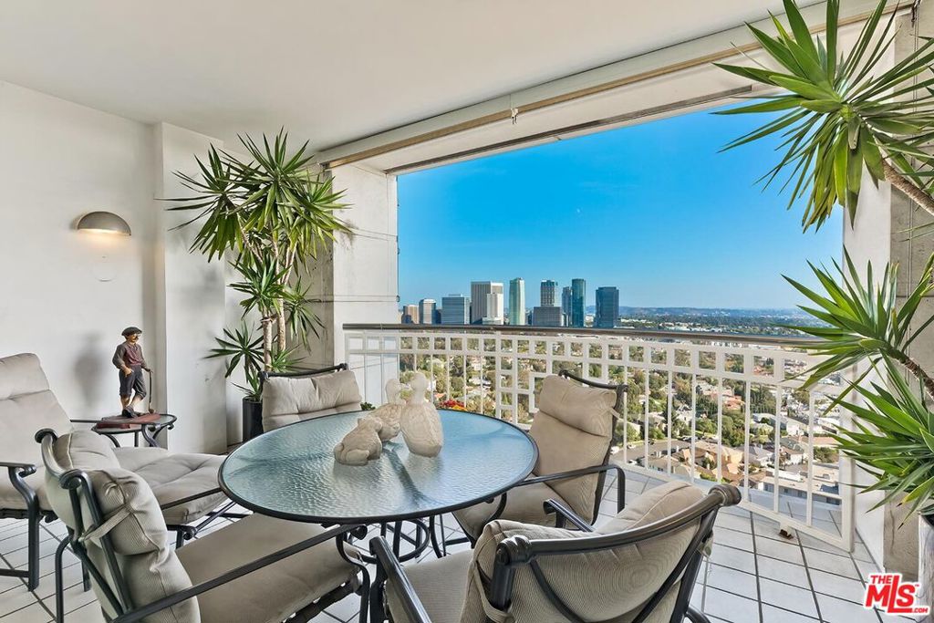 Welcome to 10380 Wilshire Boulevard, Unit 1703, in the prestigious La Tour, located on the Wilshire Corridor. Offering sophisticated high-rise living, this modern, contemporary unit offers sweeping unparalleled southern, eastern, and western exposures of the Los Angeles Skyline. As you step into this light and bright residence, you'll be greeted by an open-concept living area that seamlessly blends style and comfort. The floor-to-ceiling views of both downtown and the ocean can be seen from the living and dining area, with 2 private outdoor balconies off both the living and dining areas, offering city views. This expansive unit has 2 en-suite primary bedrooms. The 3rd bedroom has been redesigned as an office space which could also be used as a sitting room. The bedrooms are connected to large walk-in closets, and each offers ample space and privacy, including floor-to-ceiling windows, allowing for the spectacular views and natural light. Additionally, there is a large kitchen and a dedicated laundry room with side-by-side washer and dryer, and central air and heat. There is custom cabinetry in the living area and plenty of storage throughout the unit. La Tour is one of the corridor's most prestigious full-service buildings, known for its privacy, security and first-class service. With only 4 residences per floor, owners can enjoy the feel of a private home with the benefits of 24-hour security, a doorman, valet parking, and meticulous daily maintenance. Amenities also include a lovely lobby with a full-time concierge, a modern fitness center, heated pool and spa. The outside area and recreation room have recently been redone. This unit also comes with a separate storage space. Perfectly situated in the heart of the Westside, La Tour is moments from Century City, Beverly Hills, Westwood, UCLA and many dining, shopping and cultural destinations. A wonderful offering of sophistication, safety, and quality which is rarely available. Experience the upscale lifestyle that La Tour has to offer, where luxury meets modern living.