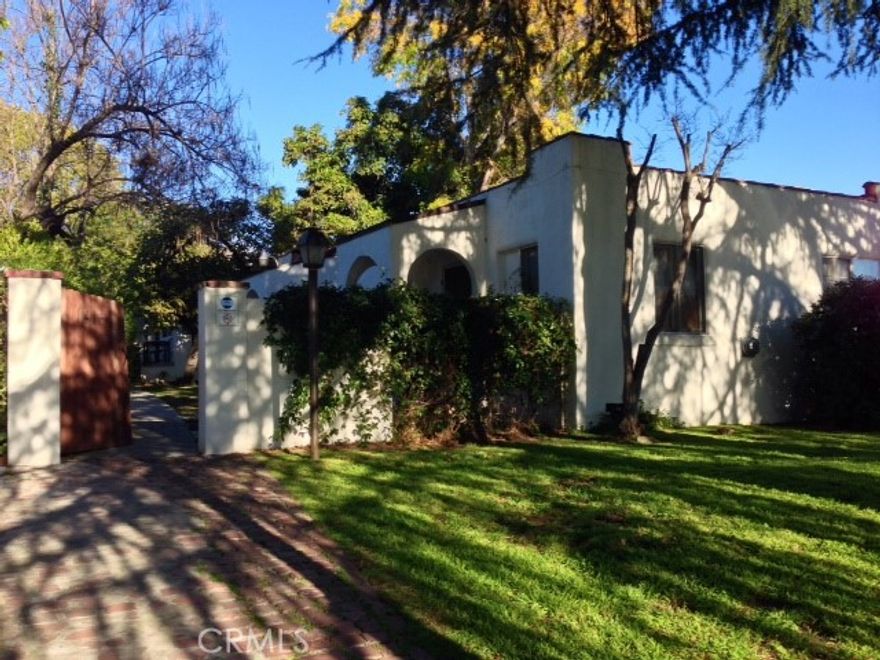 This cottage style, 1 bedroom charming unit is available for lease now.  Tons of natural light coming in and it was recently remodeled. This unit only shares one wall with the neighbor, providing privacy and tranquility. The home itself is located on an extra large lot with only 5 other homes. Common area features include mature trees, lots of open space, and picnic tables. The unit features a tankless water heater, wood/tile flooring, ductless AC/Heat, granite countertops, and upgraded plumbing and electrical. Within walking distance to the famous Kenneth Village and Brand Park, local shopping and dining destinations. It features a coin laundromat on the premises and 1 parking space. 1 year minimum lease.  Good credit required (co-signers okay). Landlord pays for water and gardening. Call for Pets.