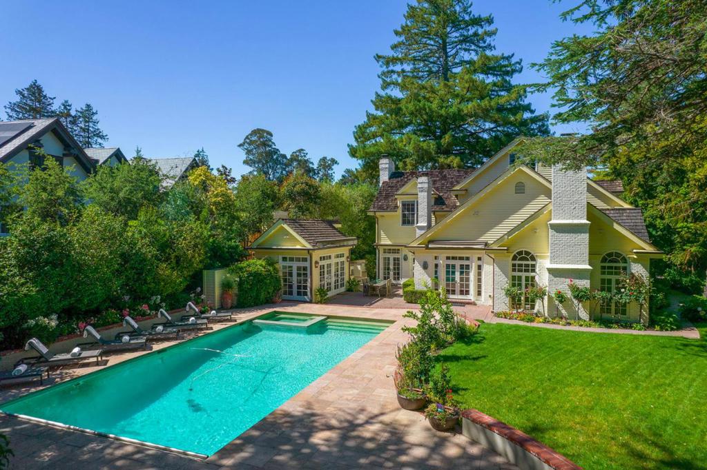 This magnificent property blends traditional time-honored architecture with sophisticated elegance and resort living all just a short stroll to downtown Burlingame. A whole-home remodel, which spans three above-ground levels, into tasteful grandeur with beautifully proportioned designer style. Sequestered from the street in prestigious lower Hillsborough, the resort-like property easily meets all of todays needs multiple spaces for office and distance learning, everything for fitness and well-being, plus a separate pool house for guests or even more office space. The main residence has 5 bedrooms, each with its own bath, a fitness center, executive office, plus top-floor recreation room. The kitchen is a chefs dream, the primary suite has two separate bathrooms, and behind-the-scenes are tech features like programmable lighting. Impressively tying it all together are the vast grounds with outdoor kitchen, pool and spa, fireplace, and even a two-story custom playhouse.