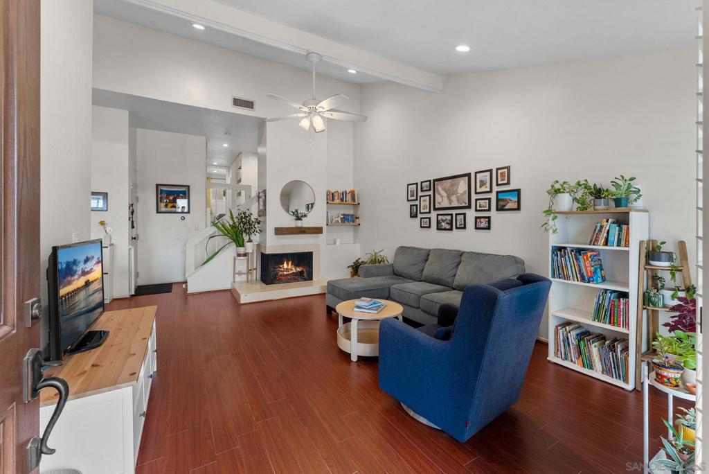 This beautifully updated split-level townhome is located in the desirable community of Del Cerro. Offering 2 bedrooms, 2 bathrooms, and 1,176 square feet of living space, this townhome features vaulted ceilings and an abundance of natural light. The inviting living room includes a cozy fireplace and flows seamlessly into the dining area and kitchen, where you’ll find stainless steel appliances, a new dishwasher, kitchen tile flooring, and a window overlooking the pool. Recent upgrades include a newer water heater, smart home features with a Nest thermostat, new LED canned lighting and fixtures throughout, remodeled bathrooms with new flooring, and new luxury vinyl plank flooring upstairs. Both bedrooms are generously sized, and the private patio is perfect for relaxing or entertaining. The attached two-car garage offers direct access, laundry hookups, and extra storage. Set within a well-maintained community with lush landscaping and a sparkling pool, this home is ideally located near parks, hiking trails, shopping, and dining, offering the perfect blend of comfort, convenience, and style in one of San Diego’s most sought after neighborhoods.