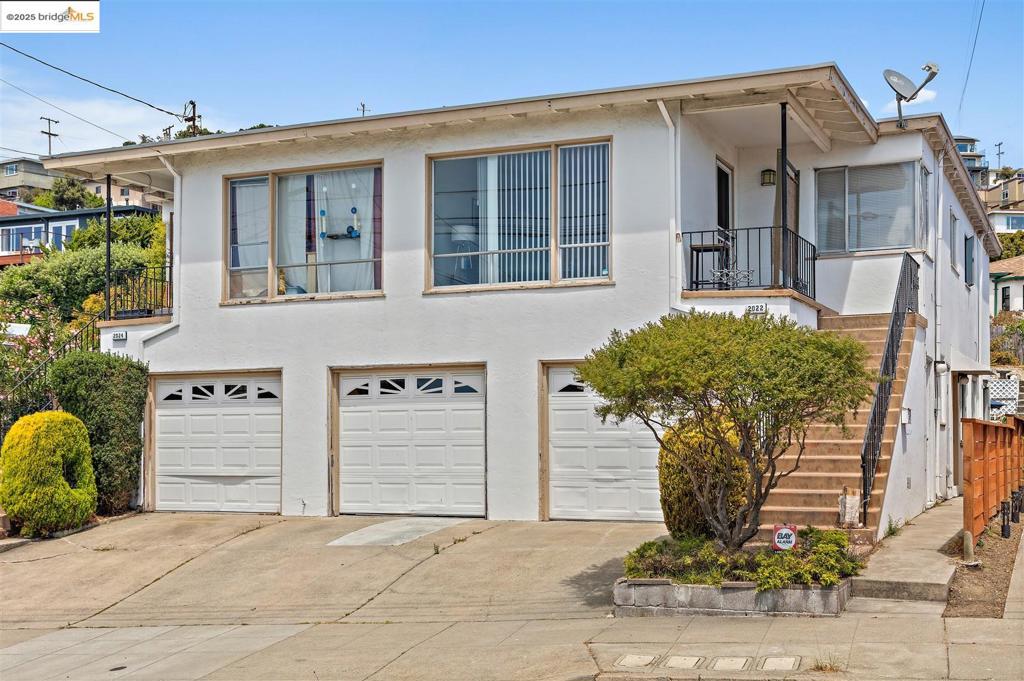 Classic Mid-Century 4-Plex with Bay Views in Prime El Cerrito Location Perched atop a serene northern El Cerrito hillside, this classic 1950s fourplex offers sweeping San Francisco Bay views and unbeatable convenience—just minutes from El Cerrito del Norte BART, I-80, the Ohlone Greenway, and local favorites like El Mono, Mi Casa Grill, and Catahoula Coffee. The property features two spacious 2-bedroom, 1-bath upper units and two 1-bedroom, 1-bath lower units, each with thoughtful layouts and original charm. An attached 3-car garage plus additional off-street parking ensures plenty of space for residents. Enjoy a terraced backyard garden, a generous shared patio area, and on-site coin-operated laundry and storage in the garage. The sewer lateral is compliant, and the roof has been recently replaced (2025). Square footage published differs from the public record. Buyer to investigate with the city. Neither seller nor listing agent has investigated or verified the accuracy of any of these sources of information.