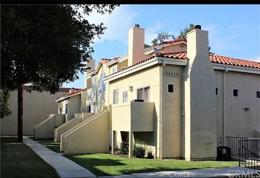Nestled in a beautiful and tranquil pocket of Newhall, this spacious 2-bedroom, 2-bath corner condo offers comfort, convenience, and privacy. With an attached 2-car garage, this move-in ready home is perfect for easy living. Step inside to find brand new carpet and a cozy fireplace in the living room, creating a warm and inviting atmosphere. Enjoy your morning coffee or evening breeze on the quaint balcony just off the main living space.

The primary suite is a private retreat, while the second bedroom offers flexibility for guests, an office, or more. The laundry area, located in the garage, includes a washer and dryer, plus generous storage throughout the home. Located just a short stroll from Lyons Avenue, you'll have easy access to local shopping, dining, and all the charm that Newhall has to offer.