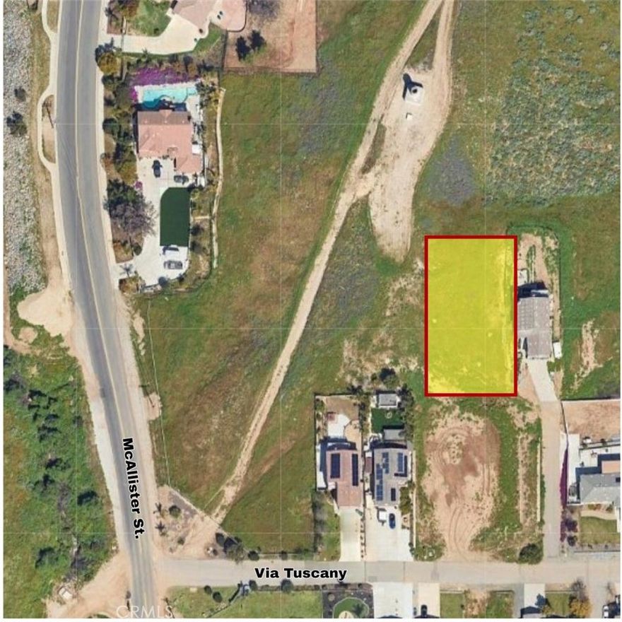 This half-acre lot offers impressive views and is ideally situated in the highly sought-after Tuscany Village community, surrounded by custom homes, providing a rare opportunity to build in a quiet, well-established neighborhood. However, the only legal access to the property is over land owned by the Water District, and obtaining that access may be very difficult. Buyers are strongly encouraged to conduct thorough research and perform their own due diligence and investigations before submitting an offer.