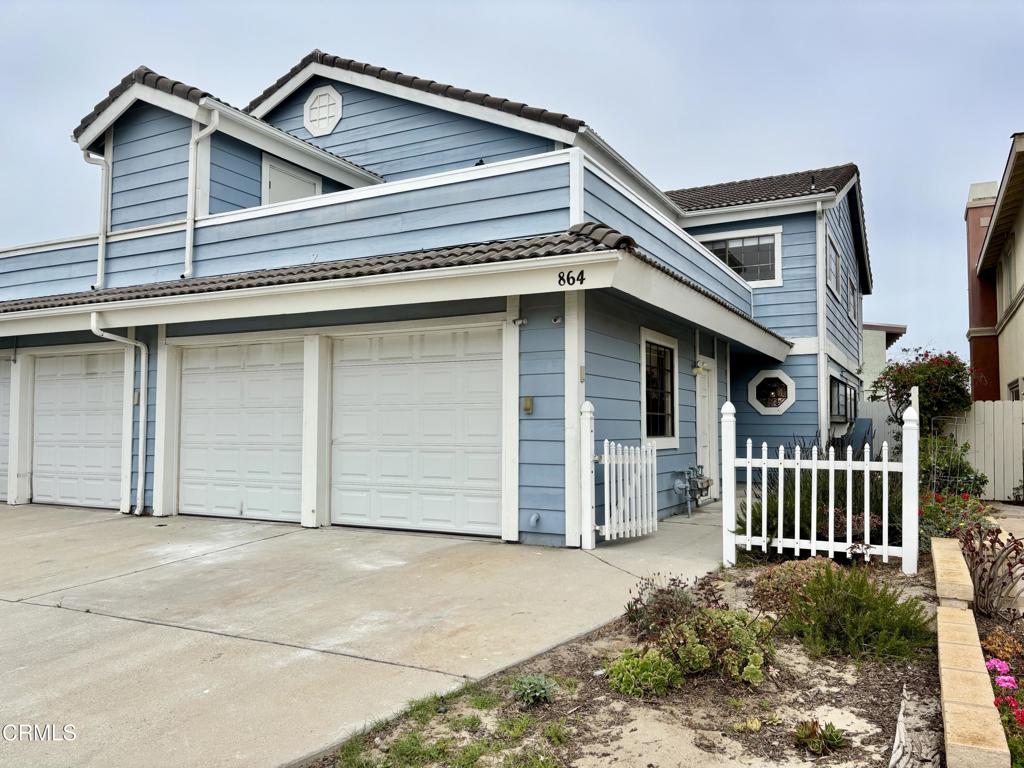 Bright and spacious 3 bed, 2.5 bath duplex perfectly located just minutes from Oxnard's beautiful beaches and the Channel Islands Harbor.Enjoy a thoughtfully designed floor plan with an updated kitchen featuring granite countertops and an open view into the dining and living areas--great for entertaining or cozy nights in. The living room includes a gas fireplace and double French doors that open to your private fenced backyard, offering the ideal indoor-outdoor flow.Downstairs, you'll find a convenient half bath, laundry area with hookups, and direct access to the attached two-car garage with additional driveway parking.Upstairs, all three bedrooms provide comfortable, quiet retreats. The primary suite boasts vaulted ceilings, a walk-in closet, en-suite bathroom, and its own private balcony. The front bedroom also features its own balcony, perfect for enjoying the ocean breeze.Freshly painted and move-in ready, this home is ideally situated near sandy beaches, local parks, shopping centers, and dining options. Whether you're commuting or working from home, you'll love living just blocks from the best of coastal Oxnard.Utilities not included.Cats considered, no dogs.