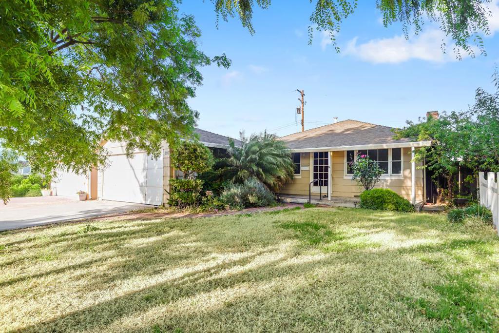 Discover this charming 3-bedroom, 2-bathroom home, peacefully nestled on a quiet street within a well-established Santa Clara neighborhood. Step inside to a spacious living room, complete with a classic wood-burning fireplace. Adjacent to the living room, you'll find a dedicated dining area that flows seamlessly into the kitchen. The home also boasts a fantastic, roomy family room that opens directly to the backyard, featuring a delightful covered gazebo and mature fruit trees. Throughout much of the home, you'll appreciate the original hardwood flooring. A two-car attached garage provides ample parking and built-in storage for your convenience. This home offers an unbeatable location, providing easy access to Central Park, a wide array of shopping on El Camino Real, and the San Tomas Expressway for effortless commuting. It is also assigned to the highly desirable Central Park Elementary School.