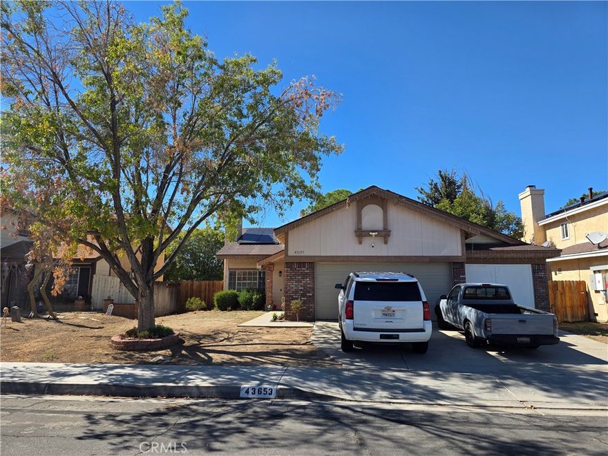 Welcome to 43653 Serenity Court — a charming single-story home on a quiet Lancaster cul-de-sac. This inviting 3-bedroom, 2-bath property features an open floor plan with vaulted ceilings, ample natural light, and an updated kitchen equipped with stainless steel appliances. The spacious living area and large backyard make it ideal for entertaining or relaxing. The primary suite features a private bath, and the attached 2-car garage provides added convenience. Close to schools, parks, and shopping, this home is ready for you to make it your own!