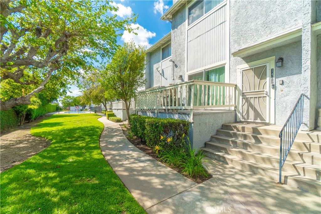 Photo of 1402 W Village Lane, West Covina, CA 91790 (MLS # DW26075464)