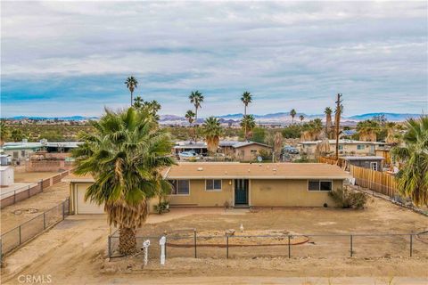 Photo of 74356 Maricopa Dr, 29 Palms, CA 92277 (MLS # JT26000296)