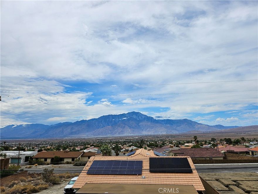 Remodeled home with beautiful mountain views in great neighborhood!  4 large bedrooms, 2 bathrooms in house, brand new kitchen and appliances, hall bathroom all brand new, new floors throughout.  open kitchen, dining and sunken living room.  Large yard, lots of hard surface.  Huge driveway plus 2 car garage with direct access.  Large side yard for potential RV parking plus additional bathroom directly accessible from side yard. Solar to save on energy costs.