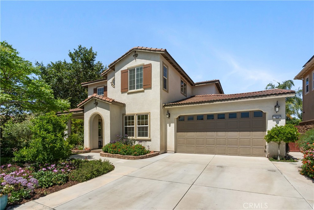 Live the Lifestyle You’ve Been Dreaming Of – in the Heart of Heritage Lakes, in Menifee! Tucked away at the end of a quiet cul-de-sac, this beautifully upgraded 4-bedroom, 3-bathroom home offers the perfect balance of luxury, comfort, and privacy in one of Menifee’s most sought-after communities. With a full bedroom and bath downstairs, this home is ideal for multi-gen living, guests, or that extra space you’ve been needing.
From the moment you arrive, you’ll notice custom curb appeal—a warm and inviting tile-accented front porch with Spanish-inspired inlaid design welcomes you into a thoughtfully designed interior featuring custom upgrades and stylish accents throughout. Inside, you’ll find an open-concept layout with extra-wide hallways, A bright loft, perfect for game nights or movie marathons, A downstairs flex space—ideal for an office, music room, or formal sitting area, A dedicated office nook upstairs, A spacious upstairs laundry room with built-in storage and folding counter, and generously sized bedrooms for everyone. Your primary suite is a true retreat, tucked privately off its own hallway with dual walk-in closets, two separate vanities, soaking tub, step-in shower, and a private water closet. Step outside and fall in love with your private backyard oasis! Enjoy a covered patio (under the roofline) with built-in lighting and ceiling fan, plus a separate pergola for dining or lounging, and a play structure for endless family fun. The yard is fully enclosed with block wall privacy fencing, and best of all—no rear neighbors or neighbors on the left side!
Additional highlights include: Fully paid-off solar system custom lighting and finishes throughout, an attached 3-car tandem garage. This home and community are close to shopping, dining, and top-rated schools—all within walking distance. Enjoy the scenic community with walking trails, Heritage Lake, parks, with many existing shopping, dining and entertainment amenities, plus exciting new amenities currently under construction.
This is more than just a house—it’s a lifestyle upgrade. This home truly checks all the boxes—style, space, location, and upgrades. Don’t miss the chance to make it yours!
