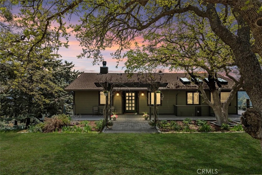 Set high above the valley on almost 10 scenic acres, this truly one-of-a-kind Bear Valley Springs estate offers sweeping views of the southern San Joaquin Valley and most of Bear Valley Springs. A long, newly graveled driveway winds through natural surroundings, leading to a peaceful and secluded mountain retreat.
This 2,800 sq ft modern farmhouse blends timeless architectural detail with upscale finishes, including honed stone and hand-scraped wood floors, Velux and Milgard windows, dimmable lighting, built-in speakers, and over 1,800 sq ft of Trex decking to take in the expansive views.
The chef's kitchen features stainless steel appliances, a 48'' dual oven with griddle, and a cozy breakfast nook. The spacious primary suite offers private deck access and a luxurious bathroom with Nordic Grey marble, a jacuzzi tub, a steam and rain shower, and heated floors. A separate walk-in closet provides plenty of space and storage.
Downstairs includes two additional bedrooms, a full bathroom with heated floors, and access to a covered patioideal for a gym, yoga space, or peaceful hangout spot. Between the main floor and lower level, you'll also find a massive laundry room with extensive storage.
The grounds include raised beds and existing irrigation lines in place, ready for new life. A detached two-car garage includes water, power, EV charger, and a dedicated workshop area. There's also a storage shed with power, and a large storage space beneath the home with water, power, and HVACperfect for tools, hobbies, or future expansion. The septic system was replaced in 2021, offering added peace of mind for years to come.
Horse potential? Absolutely. With usable acreage and unmatched seclusion, this property offers endless opportunity. Whether you're seeking a peaceful full-time residence or the ultimate mountain escape, this is the lifestyle you've been waiting for.