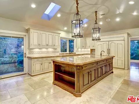 Photo of 1681 Stone Canyon Road, Los Angeles, CA 90077 (MLS # 26666917)