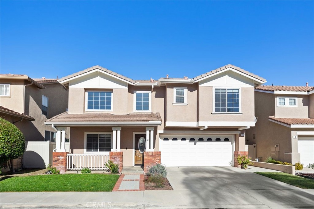 Beautifully upgraded home in the desirable California Summit community of Aliso Viejo. This inviting residence features 3 bedrooms 2.5 baths plus a versatile loft. The formal living and dining rooms showcase soaring two-story ceilings and abundant natural light, while the family room with fireplace offers a warm gathering space. The kitchen boasts granite countertops, ample cabinetry, and a center island, perfect for everyday living and entertaining. Upstairs, the spacious primary suite includes a large bathroom and walk-in closet, with additional bedrooms and loft space providing flexibility for family, guests, or a home office. Enjoy the private backyard with mature trees and a patio ideal for outdoor dining or barbecues. Conveniently located near world-class beaches, shopping, dining, hiking trails, and Soka University.