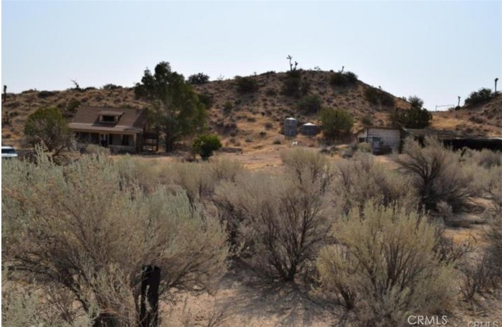 Beautiful 10 acre lot in Littlerock, with gorgeous views. Original home is uninhabitable, needs total rehab/demo, but location and lot are special. House had electric outlets at one time. Well on property buyer to verify depth and production. The lot is perfectly squared at 660'x 660'. This is serenity like you have never seen. Incredibly private.