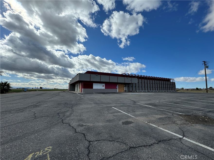 Owner financing available!! 
This expansive 14,449 square foot commercial building presents an unparalleled opportunity for businesses or investors aiming to enter or expand in the cannabis cultivation industry. Situated on a substantial 73,181 square foot lot, this property is located on the outskirts of town, offering both privacy and ample space for operations and potential expansion. The building itself is currently in a stripped down, gutted condition, providing a blank canvas for customizing the interior layout to meet specific cultivation needs.

Featuring high ceilings, the structure is ideally suited for sophisticated hydroponic systems, allowing for vertical farming solutions that maximize yield per square foot. The expansive floor plan can accommodate a variety of cultivation techniques, from traditional soil-based grows to advanced aeroponic systems. The property's location, combined with its generous lot size, also offers the potential for outdoor cultivation or a greenhouse setup, taking full advantage of natural light and reducing operational costs.

With the growing demand for cannabis and its derivatives, this property offers a unique investment opportunity. Its size, layout, and location make it a prime candidate for becoming a leading facility in the production of high-quality cannabis. The building's high ceilings not only facilitate advanced cultivation techniques but also ensure adequate ventilation and climate control, critical factors in maintaining optimal growing conditions.

This commercial building represents a strategic investment in a rapidly expanding industry, offering the flexibility to design and implement a state-of-the-art cultivation facility. With its ample space, strategic location, and adaptable interior, it is poised to become a cornerstone of the local cannabis production landscape.