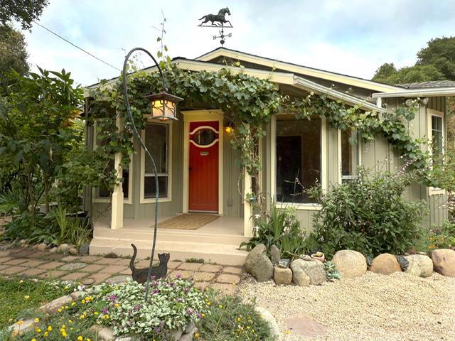 Secluded Retreat Bordering Conservation Land Privacy, Quiet, Endless Possibilities Rare opportunity to own a home on nearly 5 acres near Elkhorn Slough, in the community of Royal Oaks.This coastal property enjoys a unique microclimate cooler summers, mild winters, & fog-kissed mornings. The 2BR/1BA home features an open living area with hardwood floors, vaulted ceilings, and large bonus room perfect as a 3rd BR, studio/office. The kitchen offers cherrywood cabinetry and granite countertops. Enjoy privacy on the sandstone patio, canyon views from the redwood deck, or hike primitive paths to a view of Monterey Bay. Detached from the home nestled among oaks, are 2 inspiring hillside studios, ideal for creating: a writer's cottage, with built-in desk, and a light-filled artists retreat, with French doors that open onto a large deck with a peek of the slough. On the lower portion of the parcel, a contemplative garden invites reflection. Raised beds of organic herbs/veggies, 2 water features, and room for animals & possibly a second structure. Nature lovers will appreciate the abundance of wildlife on the property including 3 occupied barn owl nest boxes. This is a one-of-a-kind property with mild weather, privacy and quiet, yet minutes from Highway 1 or the 101. Sanctuary awaits.